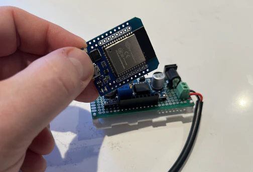 The ESP32 module fits onto the board with the processor facing out